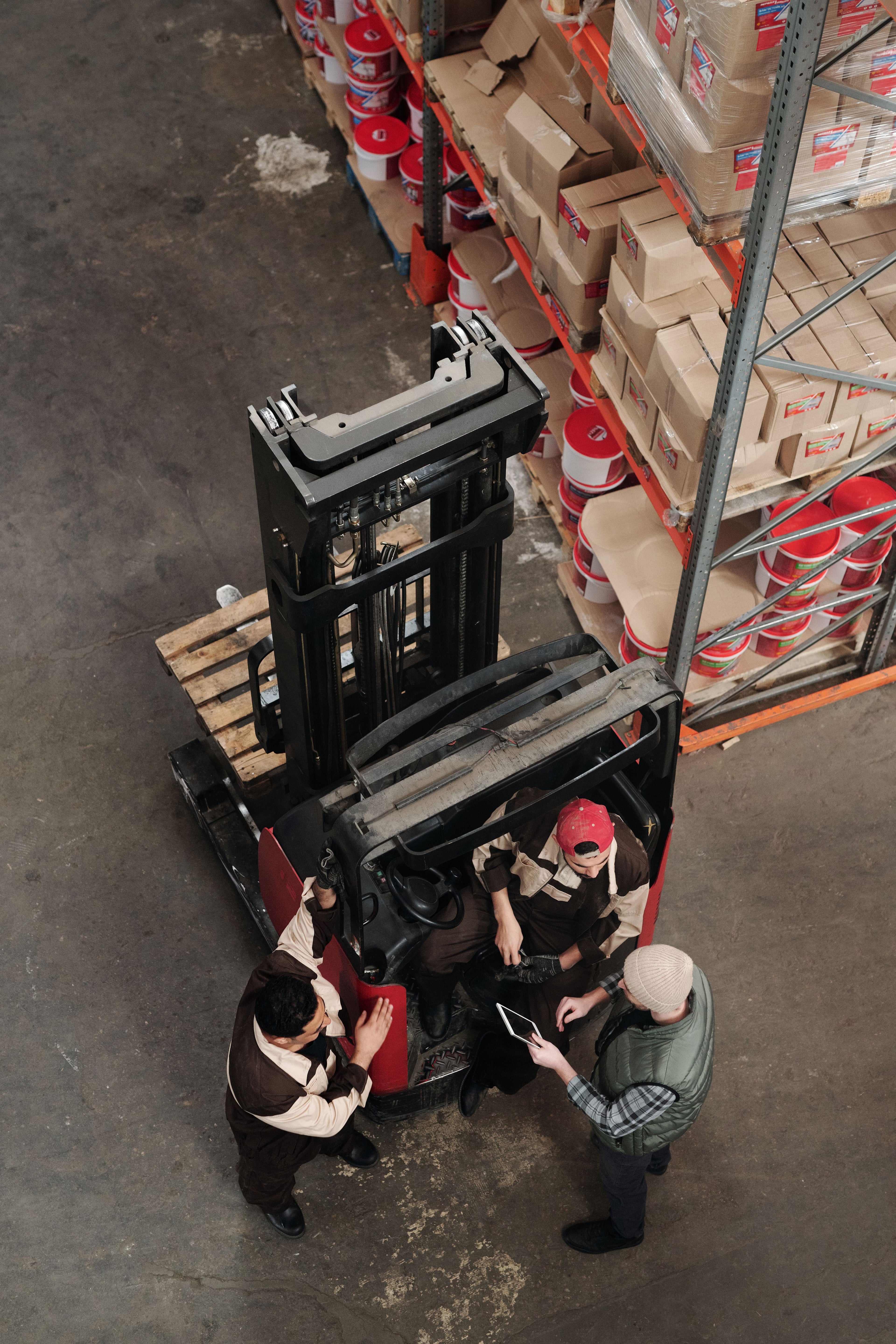 Warehouse colleagues gathering for a floor briefing